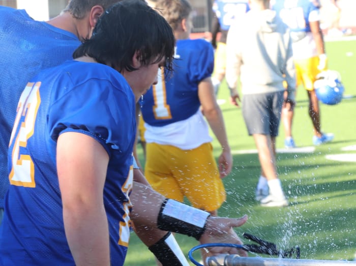 Water break for Nick Spink and the Padres. Photo: John Murphy